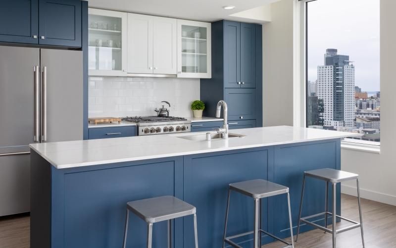 a kitchen with a blue countertop