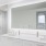 a bathroom with a large mirror