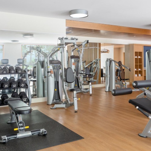 Get your workout on a room with exercise equipment and weights